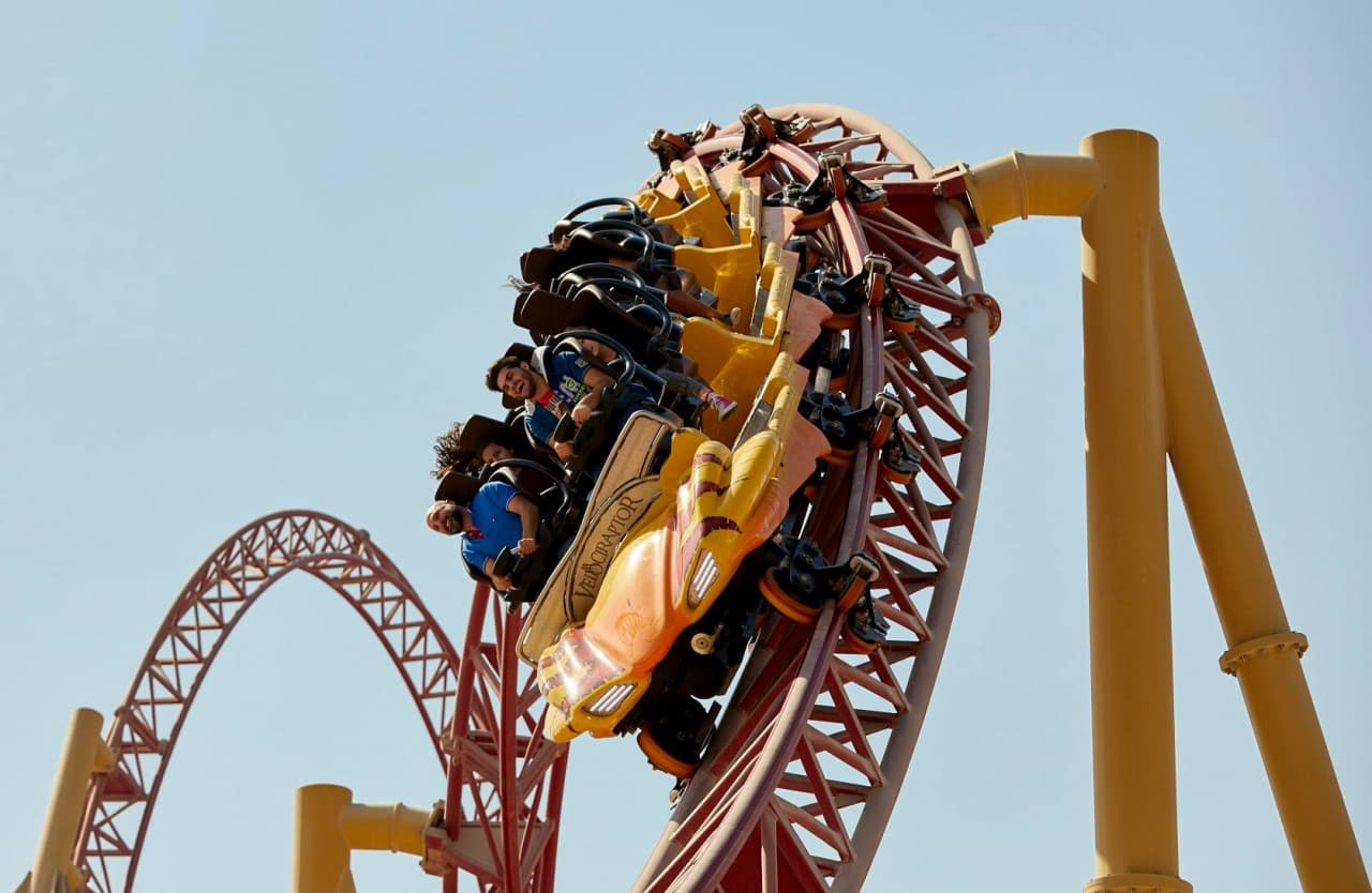 Riders on the outdoor roller coaster at IMG Worlds of Adventure